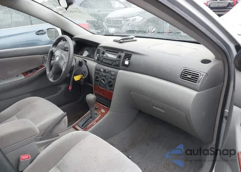 2005 Toyota Corolla Le z USA, uszkodzony, nr VIN 2T1BR32EX5C421696